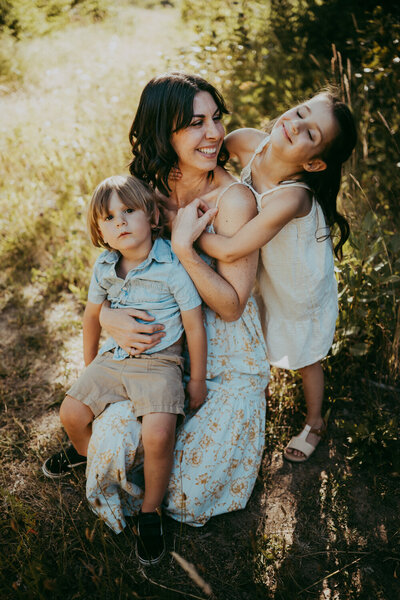 mother and two kids photographed by Portland family photographer