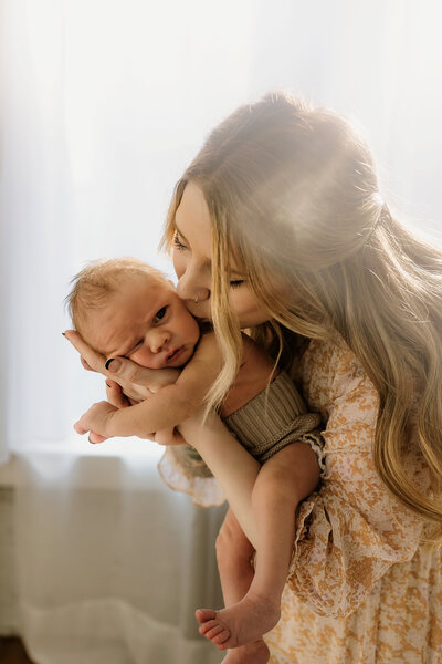Welcome to Haley Skof Photography's Calgary newborn sessions. I specialize in capturing the tiniest moments filled with boundless love, preserving these memories forever.
