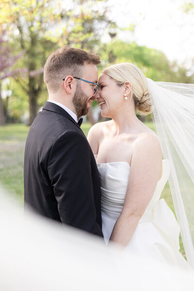 Bride and groom smiling at Bridgewater Manor Wedding