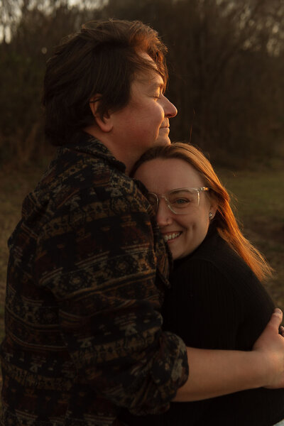 Jessica Lee and Elliott snuggling in photograph