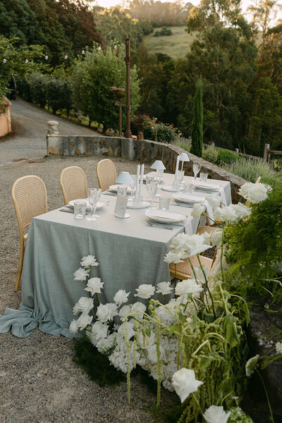 Wedding stylist setting up table
