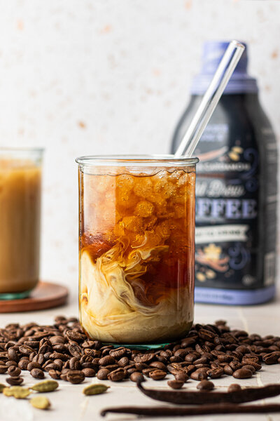 a glass showing a cold brew latte
