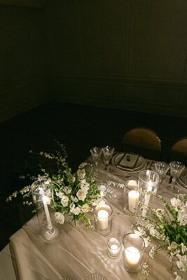 A lovely table setting for a candlelit wedding reception.