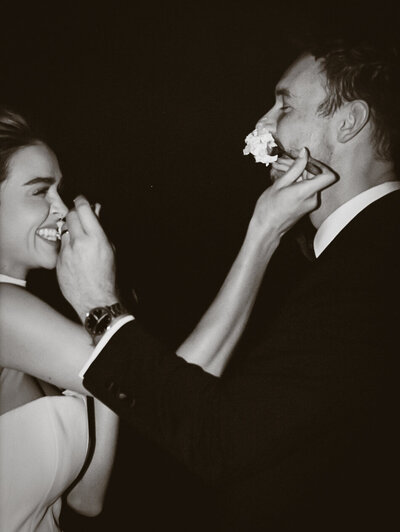 Bride and groom sharing a romantic moment in the lush gardens of Middleton Place, Charleston.