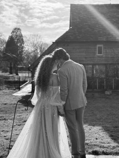 Bride laughing with the groom