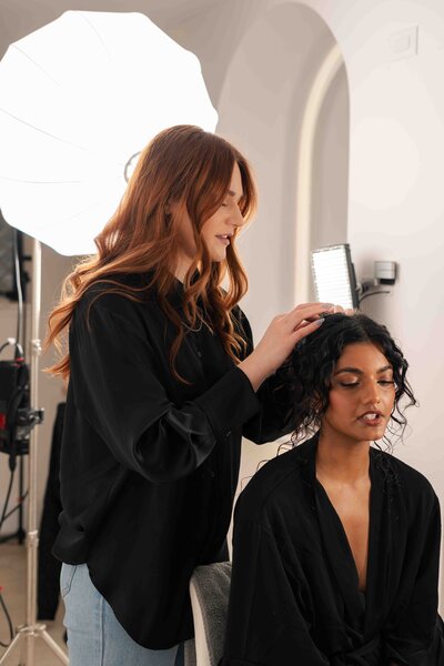 women getting hair styled