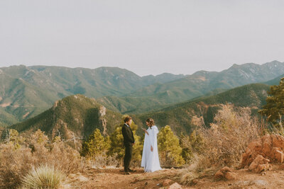 couple eloping in forest in colorado