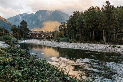 The sun goes down on an autumn evening along the Skykomish River in Index, Washington