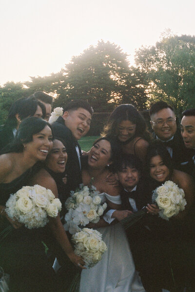 bridal party sharing drinks at wedding