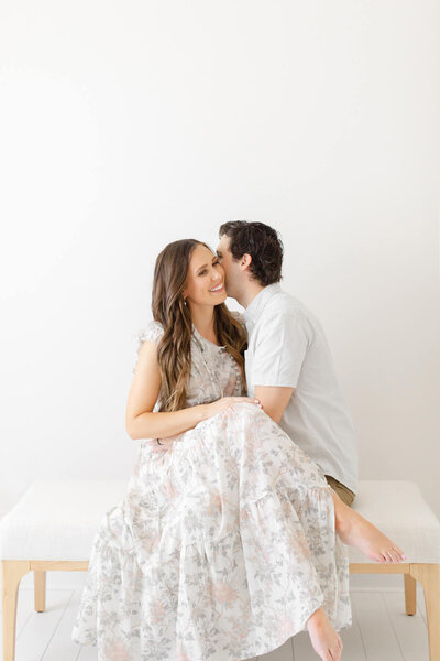 image of couple hugging during their maternity session before the birth of their baby