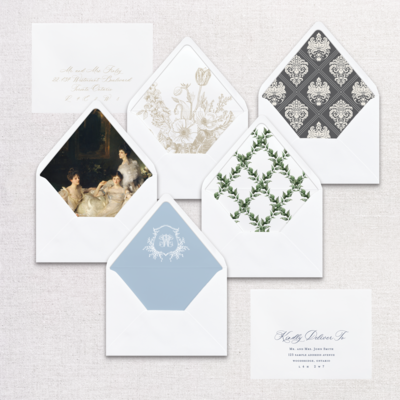 A variety of custom envelope liners including, prints, crests, coloured paper, patterns and vintage paintings