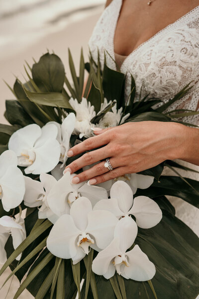St. Lucia Elopement White Wedding Dress Ring Detail Shot Above Bouquet