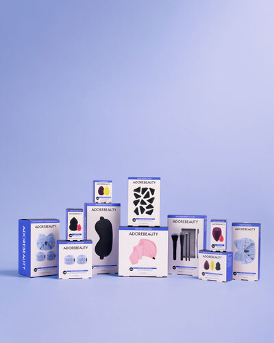 Group image of packaging design for body wash range for OC Naturals with bright abstract shapes in background