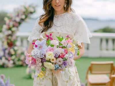pretty-bride-with-colorful-bouquet