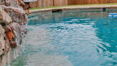 white kitchen with granite countertops  in Big beautiful home for sale in Lindsay Texas with a dreamy inground pool