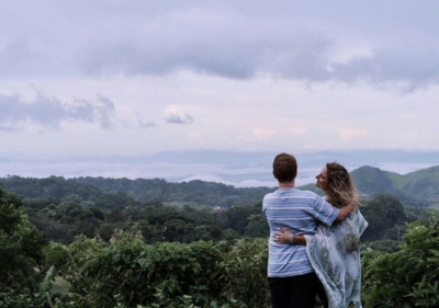 Vanessa, the expert Costa Rica Travel Specialist, and her son savoring a picturesque landscape in Costa Rica. Let them guide you to unforgettable family adventures.