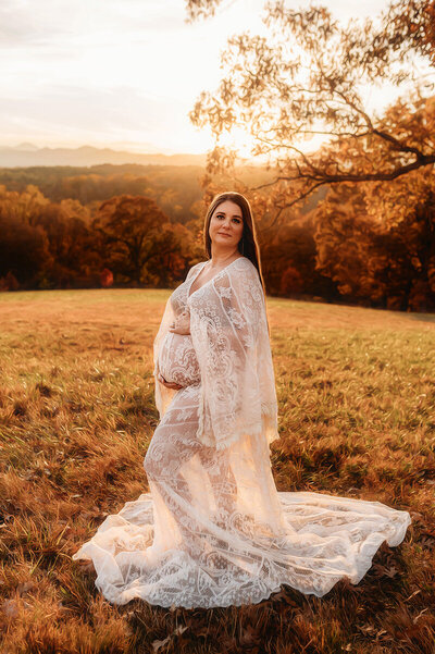 Pregnant mother poses for Maternity Photos at Biltmore Estate in Asheville.