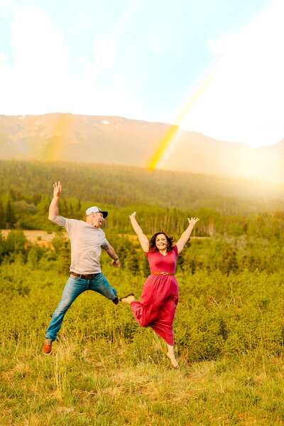 Mountain with rainbow during engagement session by Hazel & Elle Photography