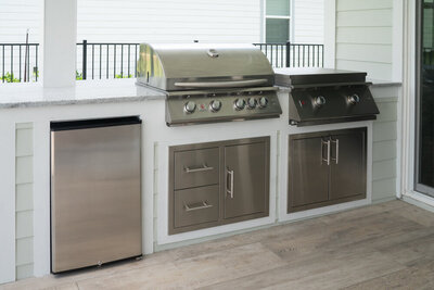 Florida luxury outdoor living space with firepit by Southern Outdoor Spaces