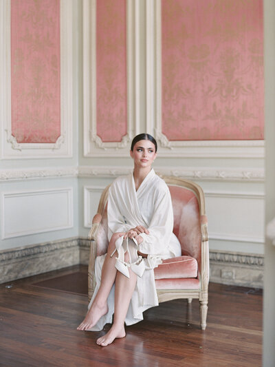 Elegant bridal portrait of a bride getting ready at Dover Hall in Richmond, VA, captured in a fine art editorial style with soft natural light.