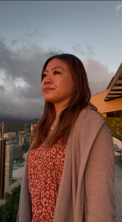 Teressa staring into the sky watching the sunset