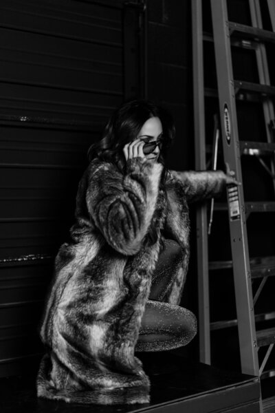 Black and white brand portrait of Juliet Trnka - founder of Direct Knowing, coyote shaman, mother, poet, and world-bringer