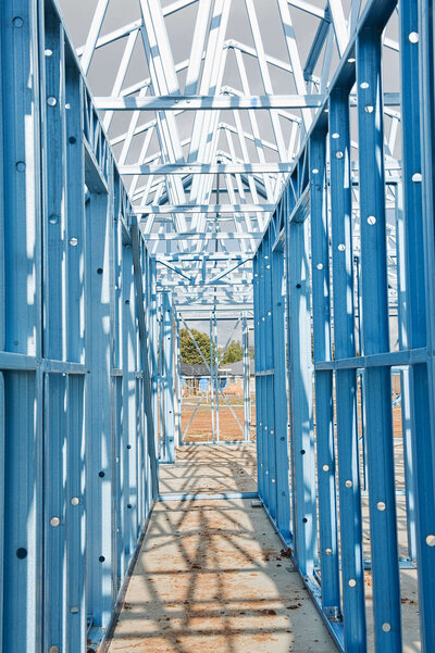 Light gauge steel is stronger, more durable, and faster to install than wood. Learn why builders in Austin, Houston, and beyond are making the switch.