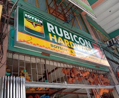 A signage indicating Rubicon Hardware Philippines Construction Materials