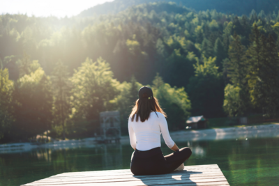 woman-looking-out-over-lake