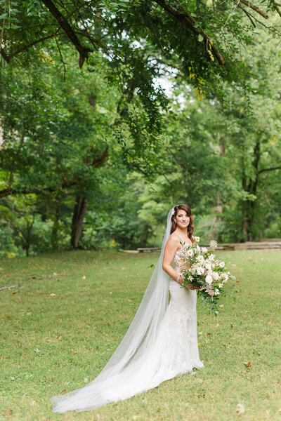 bridal portrait under the trees at five star retreat in tennessee