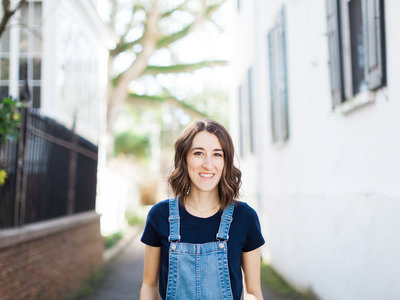 Charleston brand photographer Abby Murphy portrait wearing Madewell overalls