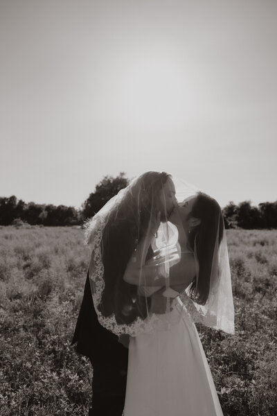 Photos by Tia is a wedding, elopement, engagement, and creative session photographer based in Austin, Texas. She offers both digital and film photography services.