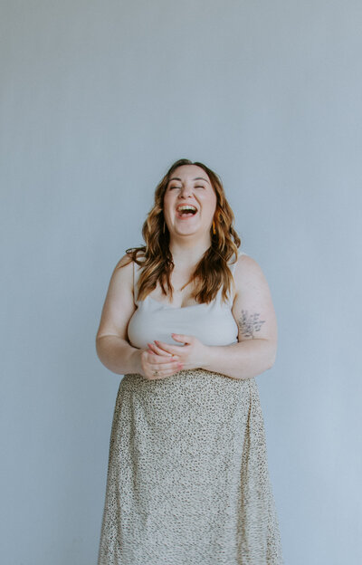 South Carolina Wedding Photographer laughing in field