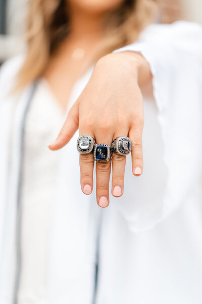 Chattanooga senior photography session detail shot of championship rings.