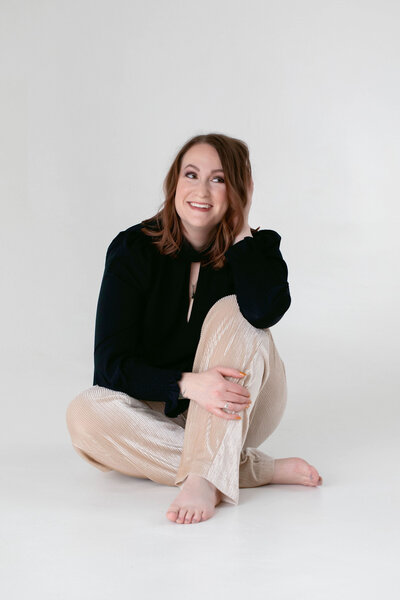 woman sitting with white background