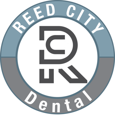 Circular logo with text that says Reed City Dental