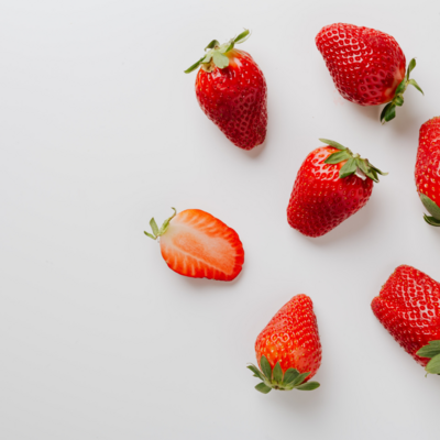 Juicy strawberries sliced neatly, ready to be used in healthy recipes or enjoyed as a nutritious snack.