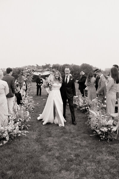 Playful wedding couple toasting with colorful cocktails during their outdoor celebration — captured on film by a film wedding photographer at Castillo Holliday Photo + Film.