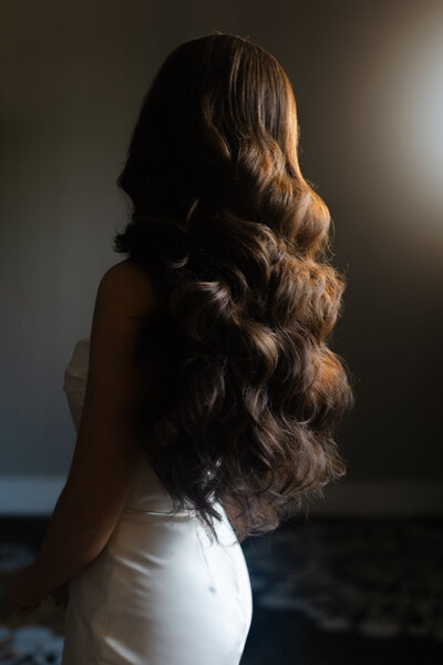 Achieve timeless glamour with a stunning bridal updo crafted by our Philadelphia stylist