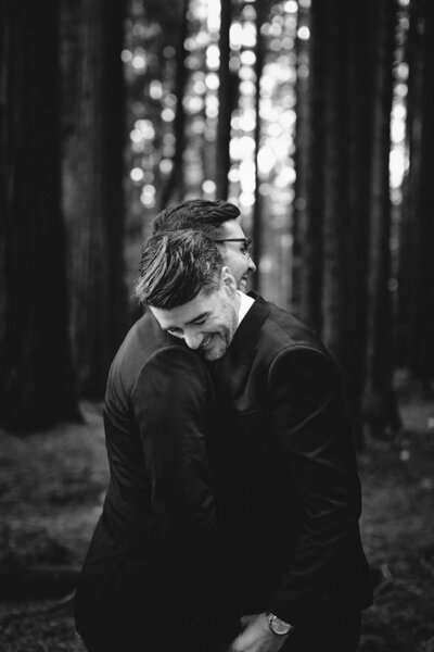 black and white image couple embracing