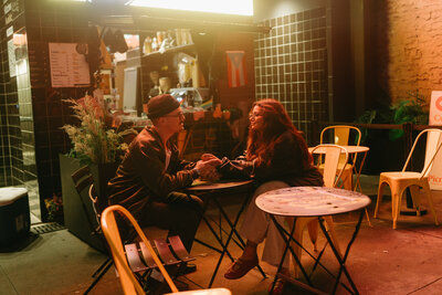 couple hugging near train station