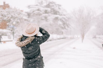 jacqueline burns taking photo in the snow