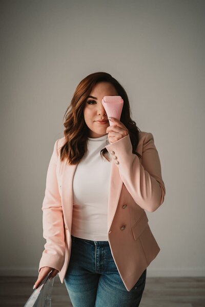 Headshot of Emily Holding Product