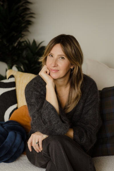 Professional headshot of Mary Robinson, founder of Node Psychotherapy, offering therapy for driven individuals, couples, and professional partnerships.