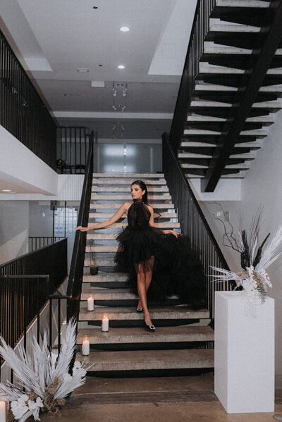 Modern and moody all-black editorial at The Pioneer, a historical industrial wedding venue in Calgary, featured on the Brontë Bride Blog.