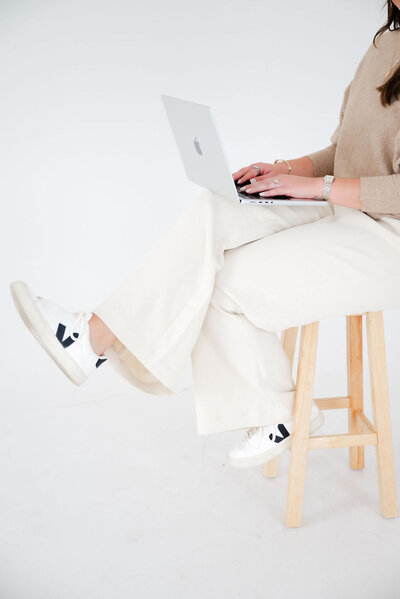 Image showing a designer working on branding and Showit web design for small businesses