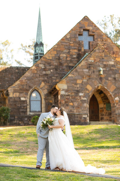 bride and groom touching foreheads