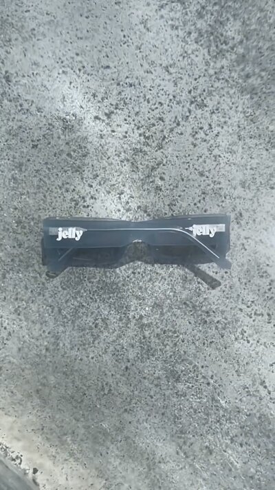 Black Jelly sunglasses on sea fllor