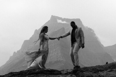 bride and groom on mountain
