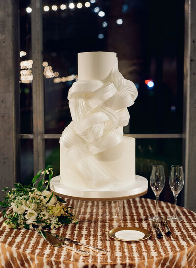 Detailed wedding cake with sugar leaves